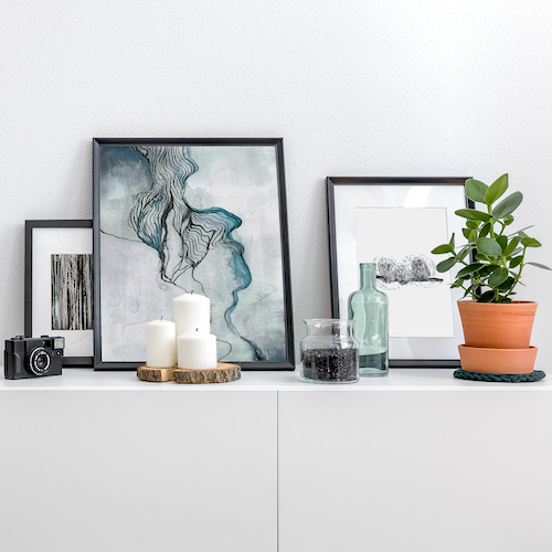 Ready made frames displayed on a shelf